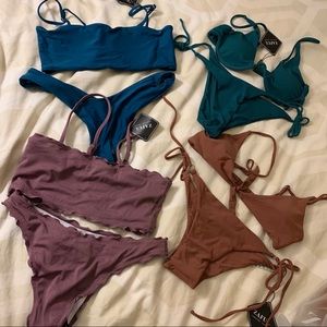 4 Bikinis, never worn with tags, all size Med.